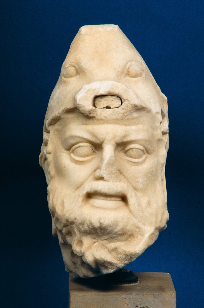 Marble head of a bearded man wearing a helmet