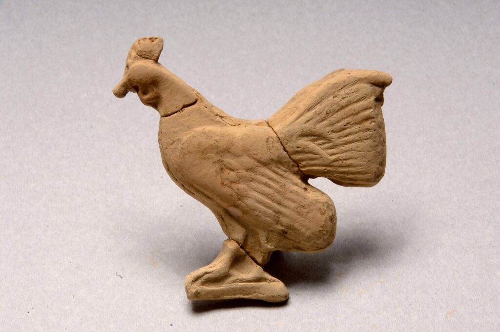 Clay plaque depicting a cockerel